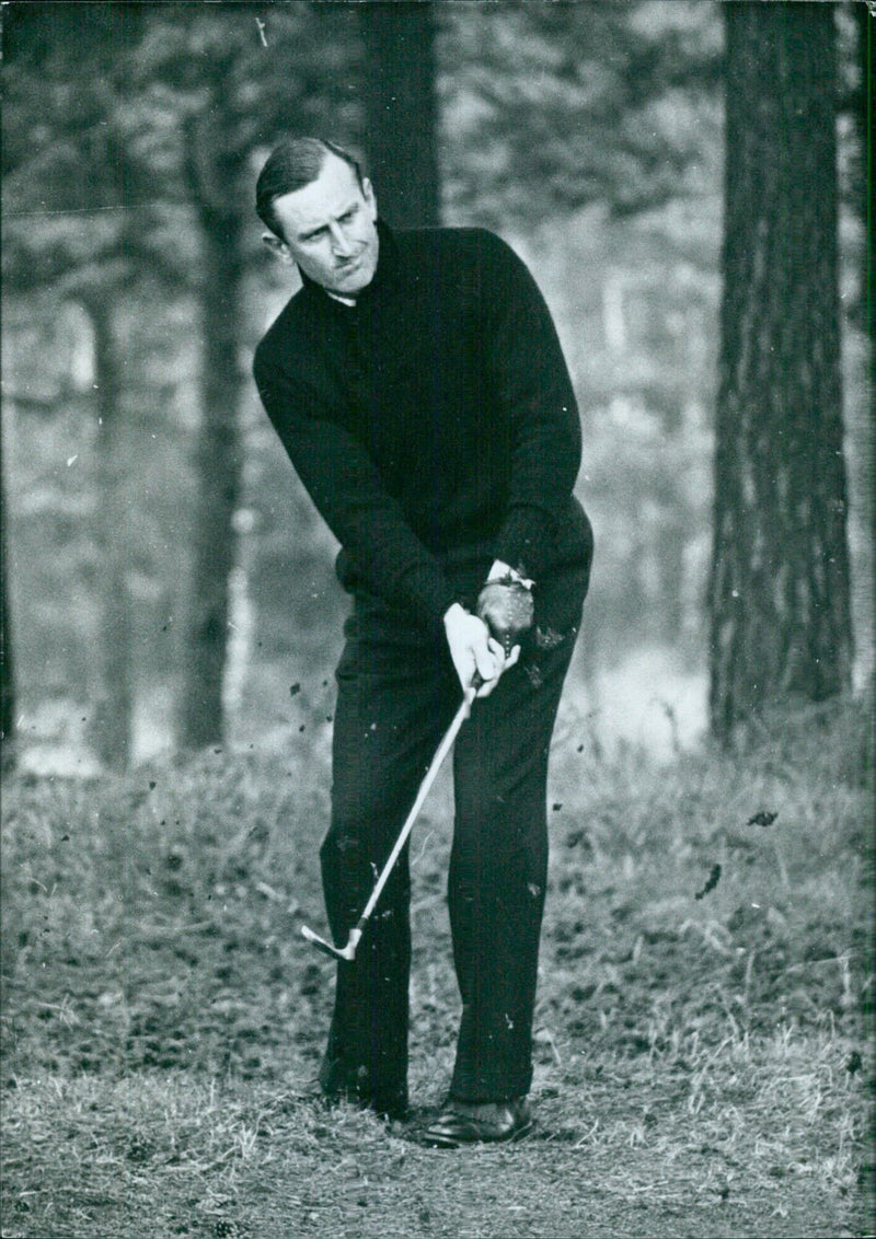 England's Cricket Captain Ted Dexter plays a round of golf, showing off his powerful hitting skills. - Vintage Photograph