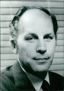 FRANS VAN DEN HOVEN, Chairman of Unilever NV, is photographed on 13th May 1975. - Vintage Photograph