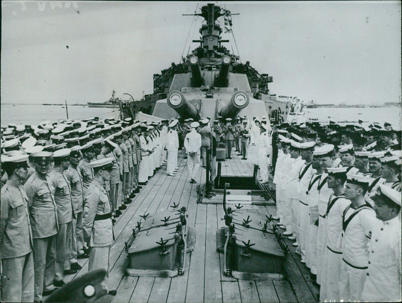 British and French naval personnel inspect a battleship of the Mediterranean Fleet at Alexandria, Egypt in May 1940. - Vintage Photograph