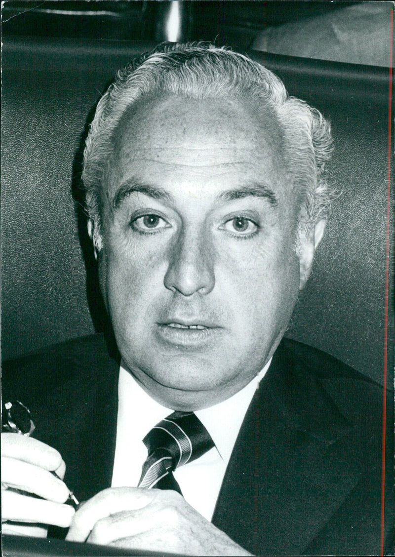 Spanish Politicians Manuel Jimenez de Parga, Minister of Labour since June 1977, and Piasse acknowledge each other during a meeting in Madrid.  Photo Credit: Nicole Herzog-Verrey/Camera Press/A&Å Bildarkiv. - Vintage Photograph