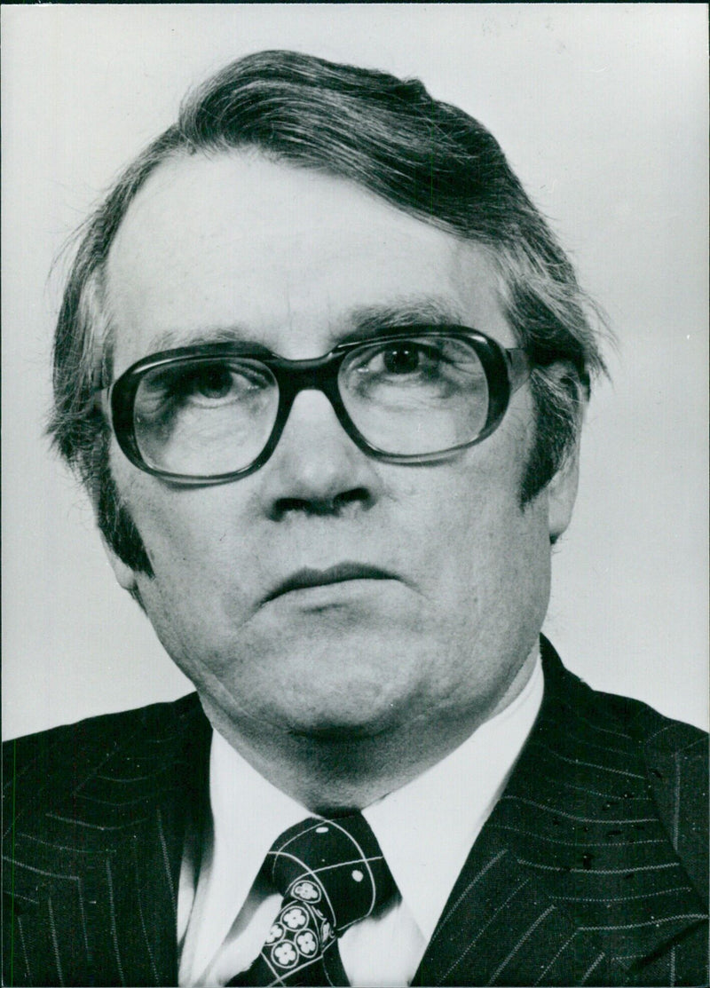 Finland's Minister of Defence, Taisto Tahkamaa, of the Centre Party, speaks at a press event in Helsinki. - Vintage Photograph