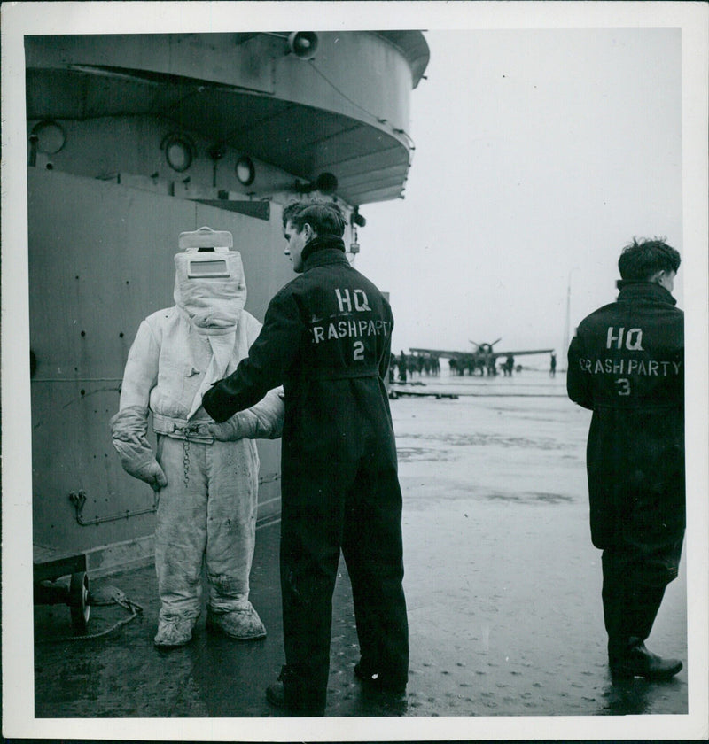 Members of the 12th Jarl VTIVE Z squadron attend a hangar party at HQ Rashpart 2, celebrating the successful conclusion of the Grand Ch com h he es mission. - Vintage Photograph