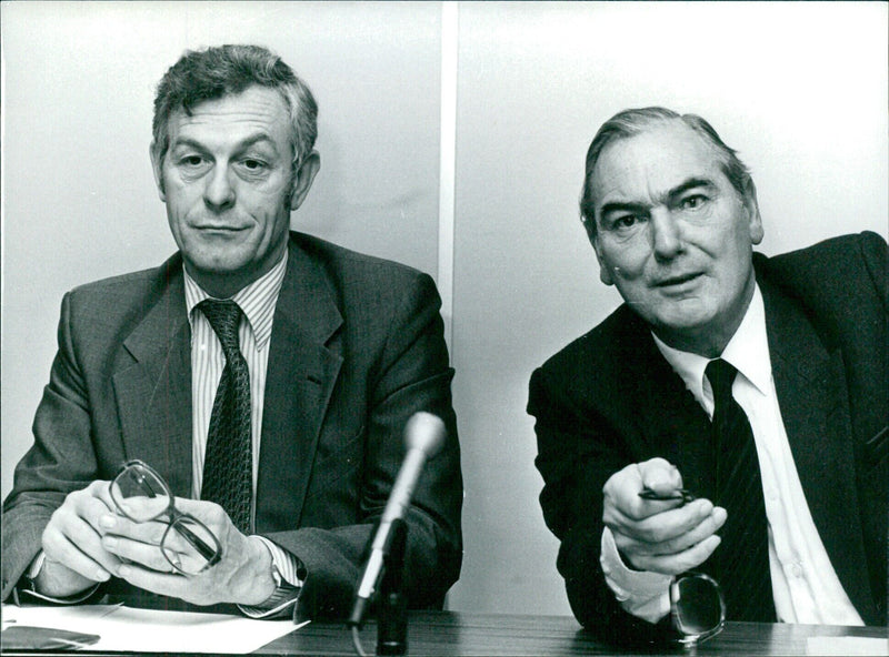 British Rail Executives Sir Peter Parker (right) and Cliff Rose hold talks at Euston House in an effort to avert further strikes by ASLEF drivers in January 1982. - Vintage Photograph