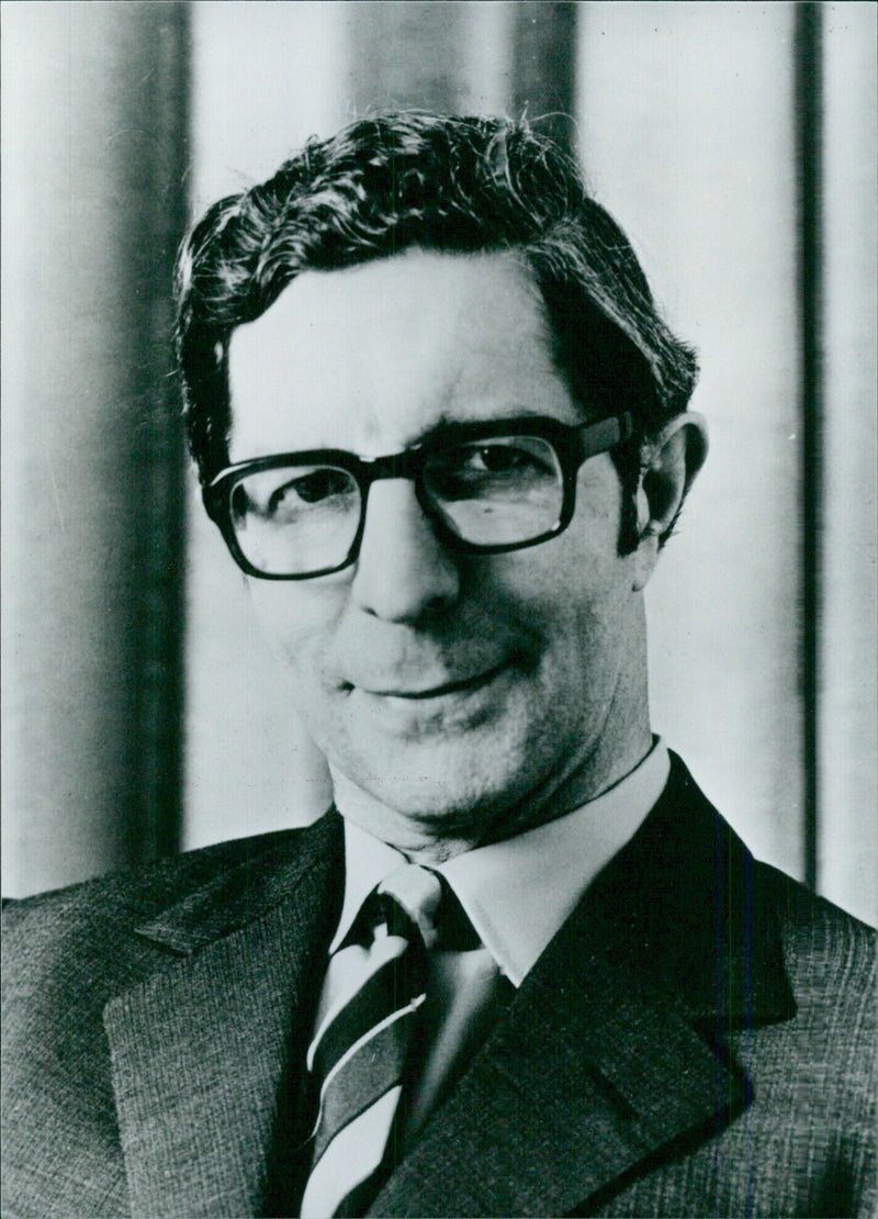 Sir Clive Rose, Britain's Permanent Representative to NATO, attends a meeting in Brussels in 1987. - Vintage Photograph