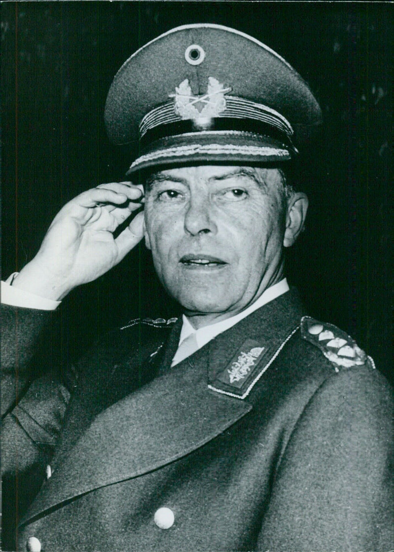 In Stockholm, Sweden, Lieutenant-General Hans Röttiger, Head of the Army Department of the Federal Ministry of Defence in Bonn, attends a meeting with West German Service Chiefs. - Vintage Photograph