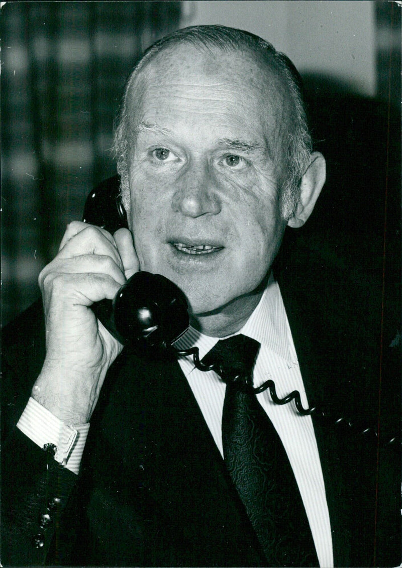 Sir Don Ryder, financial adviser to the British Government since 1974 and head of the National Enterprise Board, poses for a portrait in 1974. - Vintage Photograph