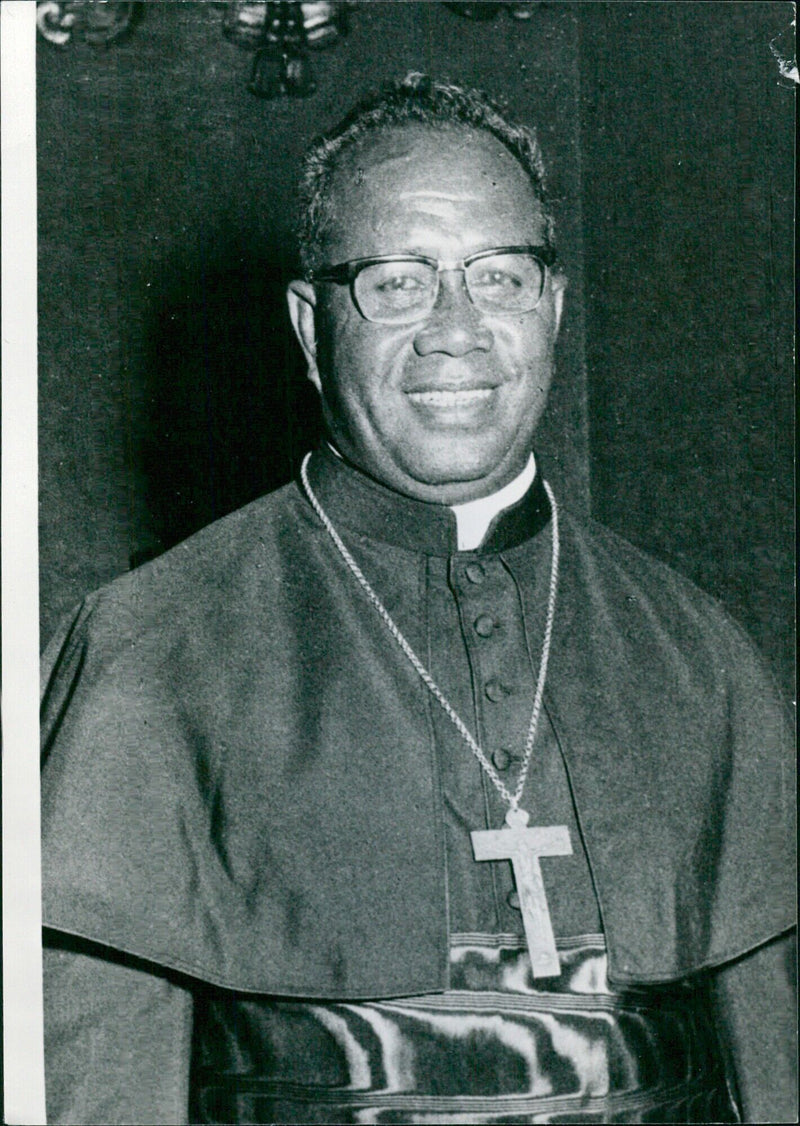 Cardinal Pio Taofinu U, the Roman Catholic Archbishop of Apia since 1968, is pictured participating in a traditional kava ceremony in Savaii, Samoa. - Vintage Photograph