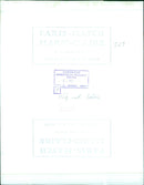 A couple poses in front of the International Magazine Service building in Paris, France. - Vintage Photograph