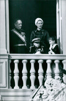 A group of people gather in front of a building in Paris, France on an autumn day. - Vintage Photograph