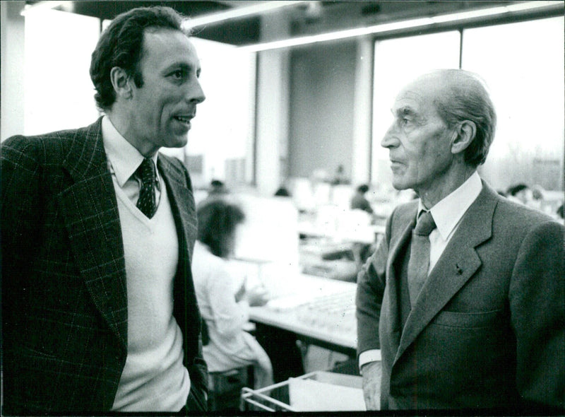 Robert Ricci, head of the French fashion house Nina Ricci, and his son Jean-Louis Ricci, pose for a photo. Photographer: Michel Baret/Camera Press. - Vintage Photograph