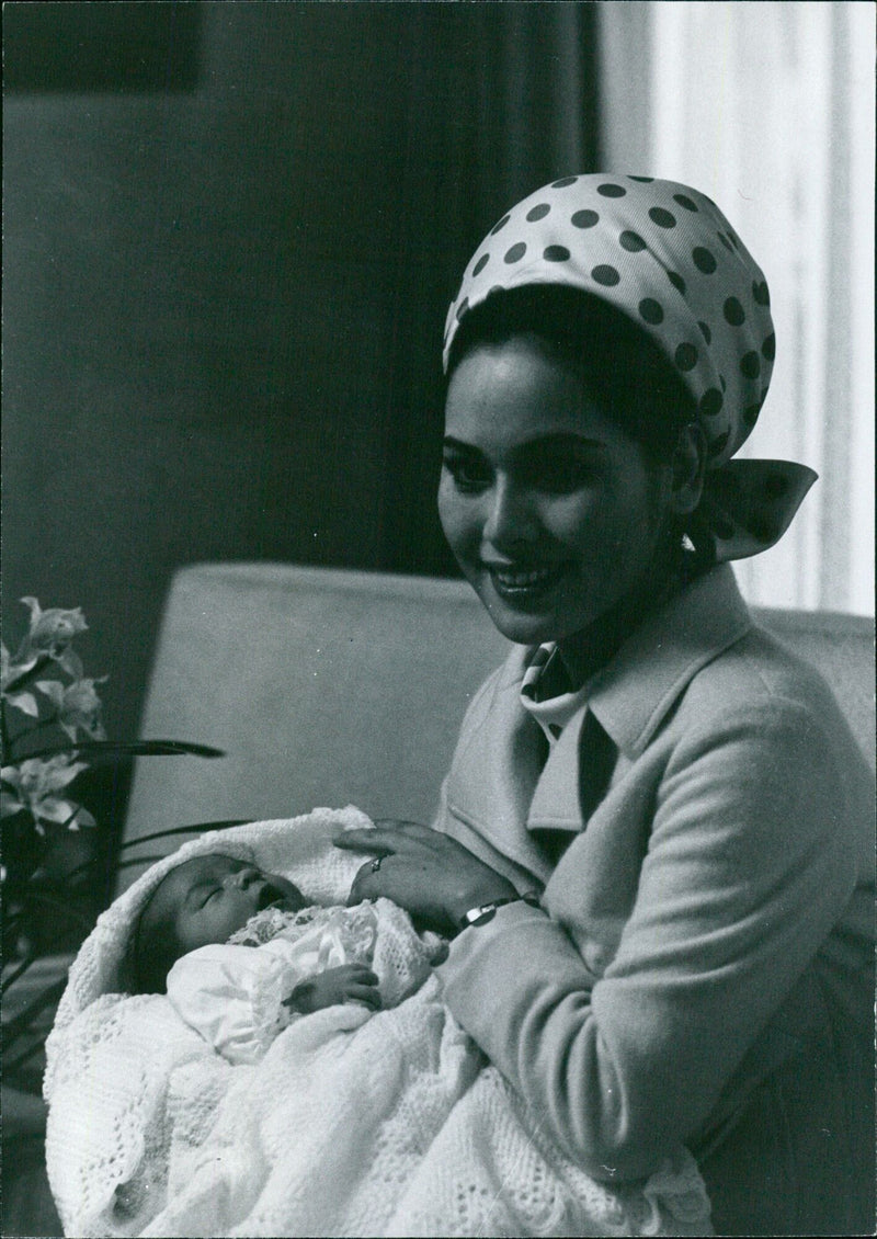 Indonesia's first lady, Dewi Sukarno, is seen attending a state ceremony on November 6, 1961. - Vintage Photograph