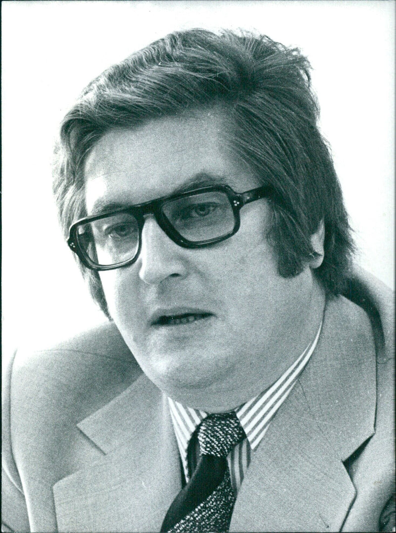 Dr. HORST-LUDWIG RIEMER, a leading member of the Free Democratic Party (FDP), speaks with members of the Parliament of North Rhine Westphalia in Germany. - Vintage Photograph