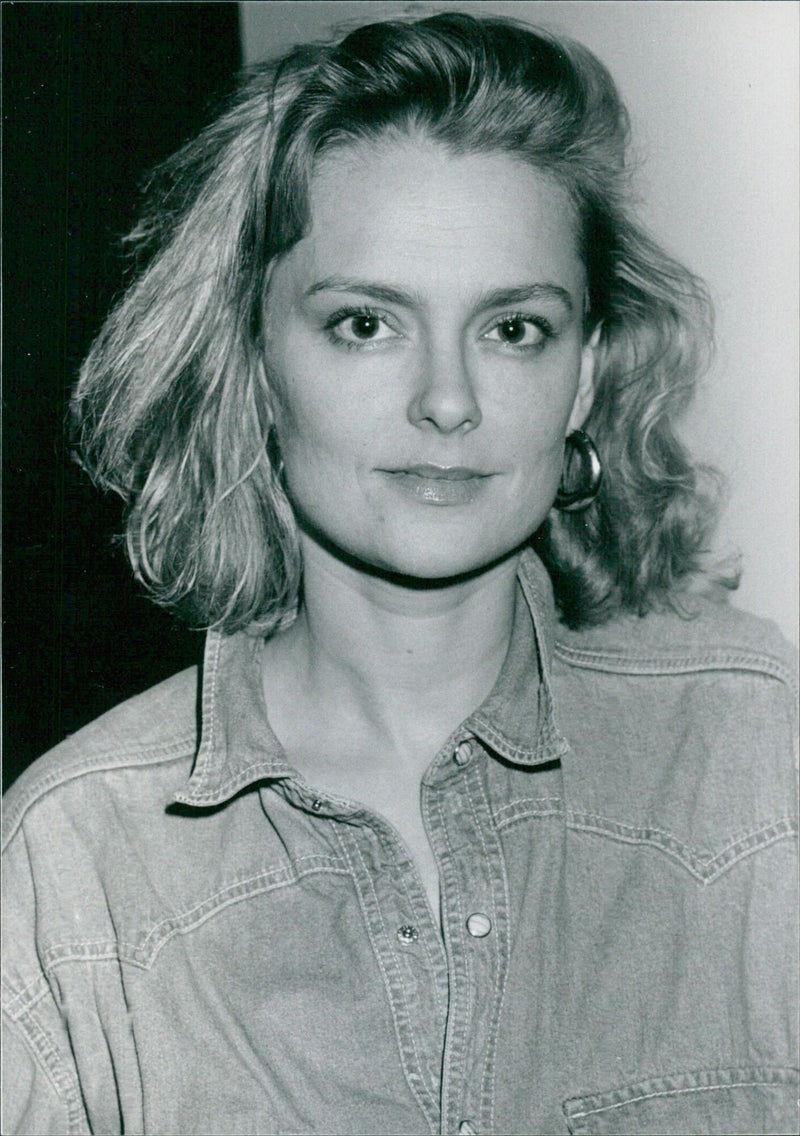 Actress Marie Richardson poses for a photo shoot, wearing a blue dress, in Malmö, Sweden on 2021-04-15. Photo by Lars Anderson for Book Magazine Press. - Vintage Photograph