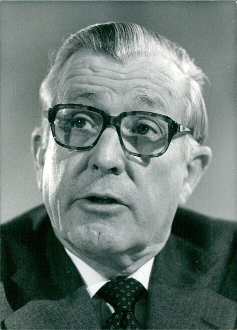 Secretary of the U.S. Treasury, Donald T. Regan, gives a speech at a press conference in 1984. - Vintage Photograph
