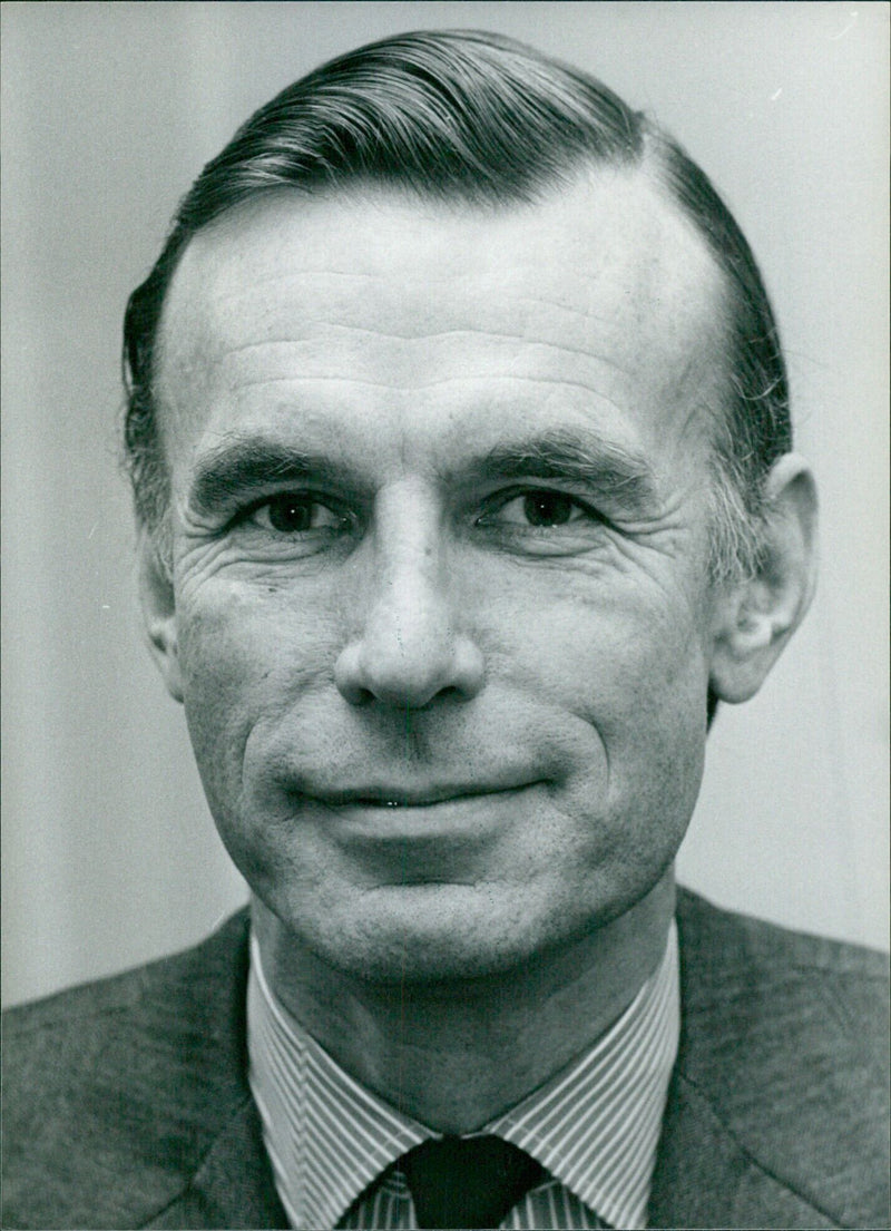 British businessmen Christopher Reeves, Deputy Chairman and Chief Executive of Morgan Grenfell & Co., pose for a photograph on December 1980 in London, United Kingdom. - Vintage Photograph