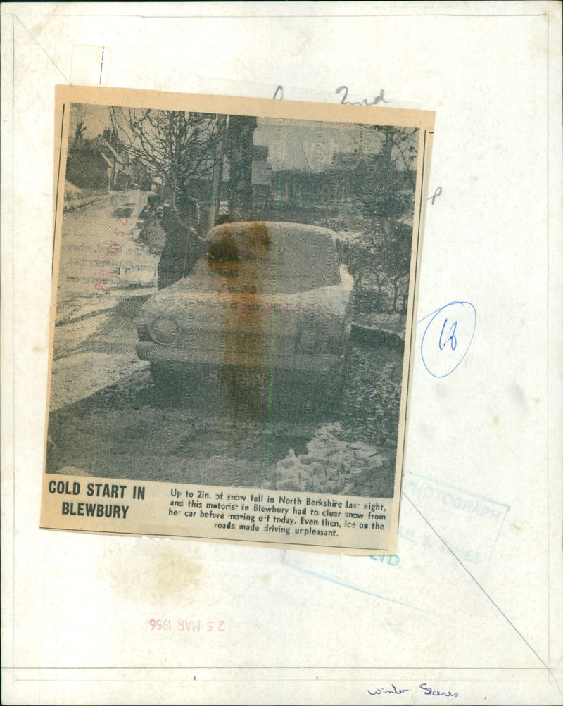 A motorist clears snow off their car in North Berkshire. - Vintage Photograph