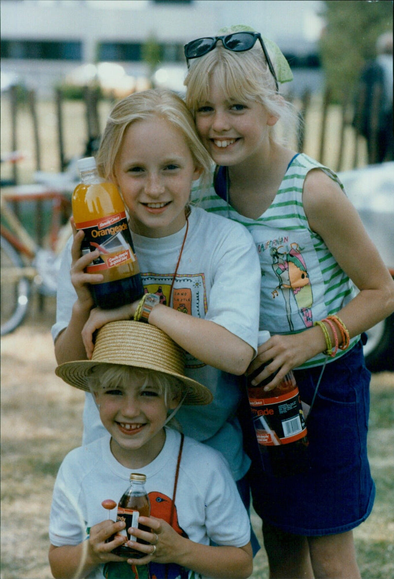 A family enjoys a sunny day at a park in California. - Vintage Photograph