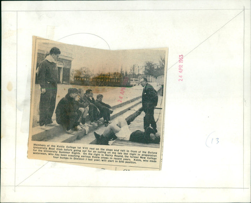 Members of the Keble College 1st VIII prepare for the University Summer Eights by resting and rafting on the Isis. - Vintage Photograph