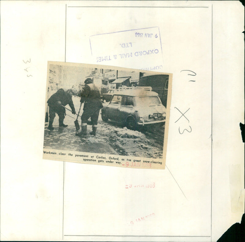 Workmen clear the pavement in Oxford as snow-clearing operation begins. - Vintage Photograph