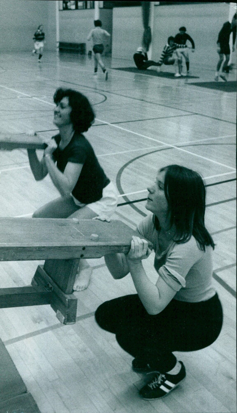 Christine Maggs and Michelle Roche of the Monknxxbox Ladies Rowing Team training with 'bench heaves'. - Vintage Photograph