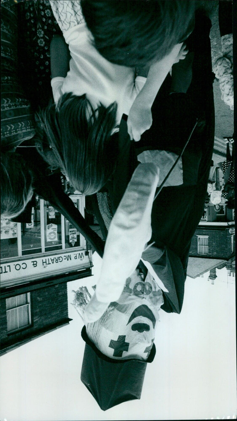 A giant puppet created by TOOT (The Other Oxford Theatre) is seen at the Bullingdon Street Fair in Oxford, England. - Vintage Photograph