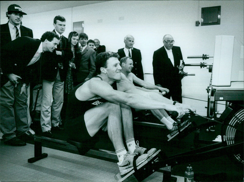 Lord Jenkins joins Oxford University athletes to celebrate the opening of the OUBC Building on March 31, 1993. - Vintage Photograph