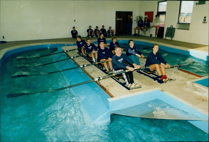 Members of the University Boat Crew squad and President Matt Pinsent train in a rowing tank at Iffley Road. - Vintage Photograph