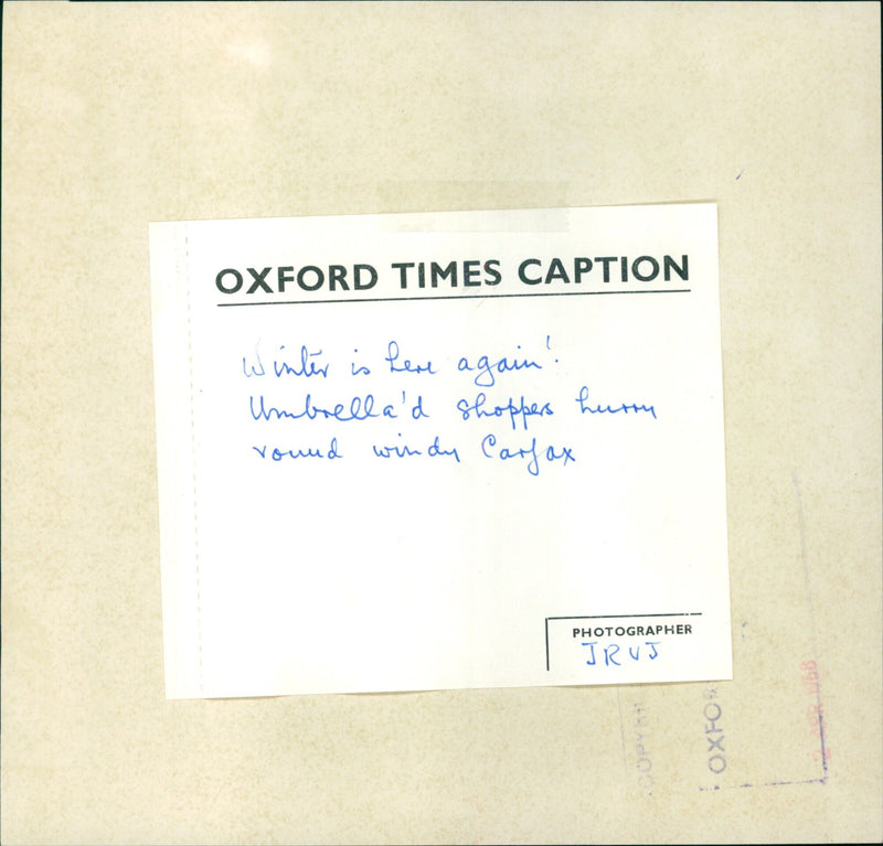 People braving the windy winter weather in Oxford, UK. - Vintage Photograph