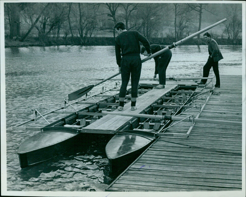 A crew of rowers prepares to board their boat at Radley College. - Vintage Photograph