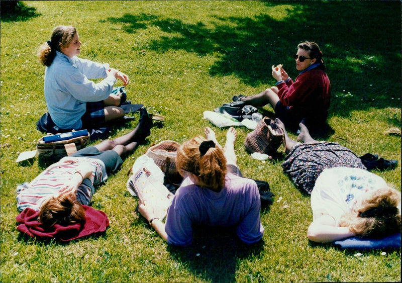 Visitors enjoy the warm weather in Oxford's Christ Church Meadow on May 15, 1992. - Vintage Photograph