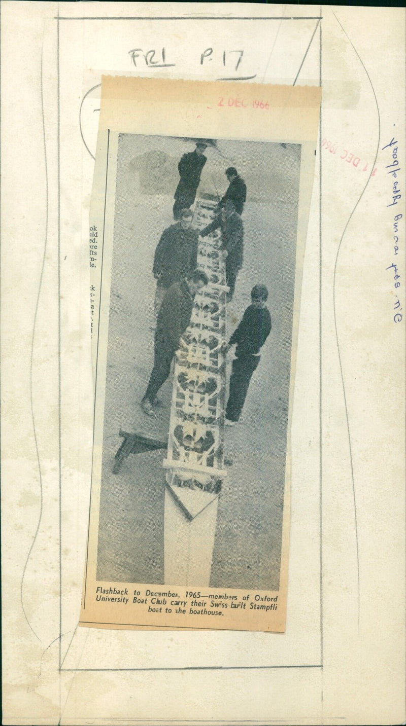 Members of Oxford University Boat Club carry their boat to the boathouse. - Vintage Photograph