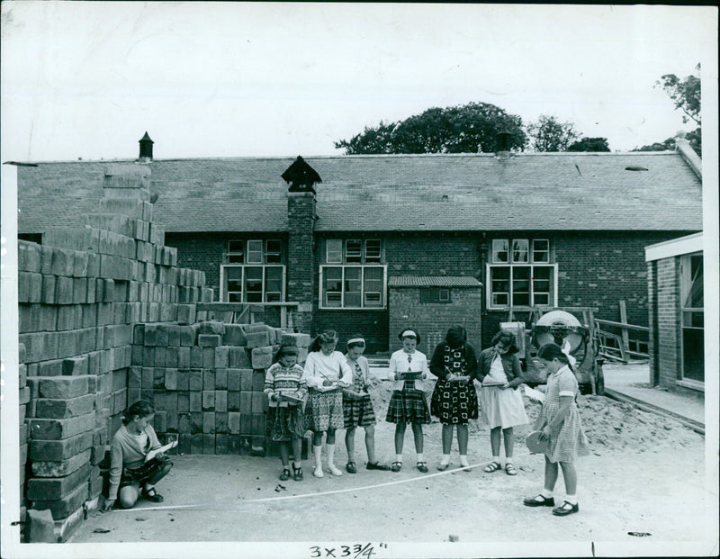 Members of the 8¾ PD Copper P3 Weds Unit pose atop their horses in the ISIS Oeschool. - Vintage Photograph