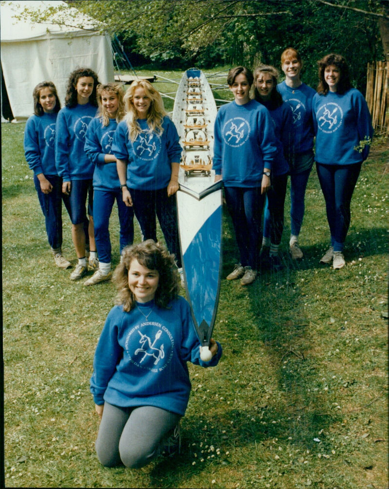 Eight students from St. Hilda's College celebrate with their new plastic boat ahead of a race. - Vintage Photograph