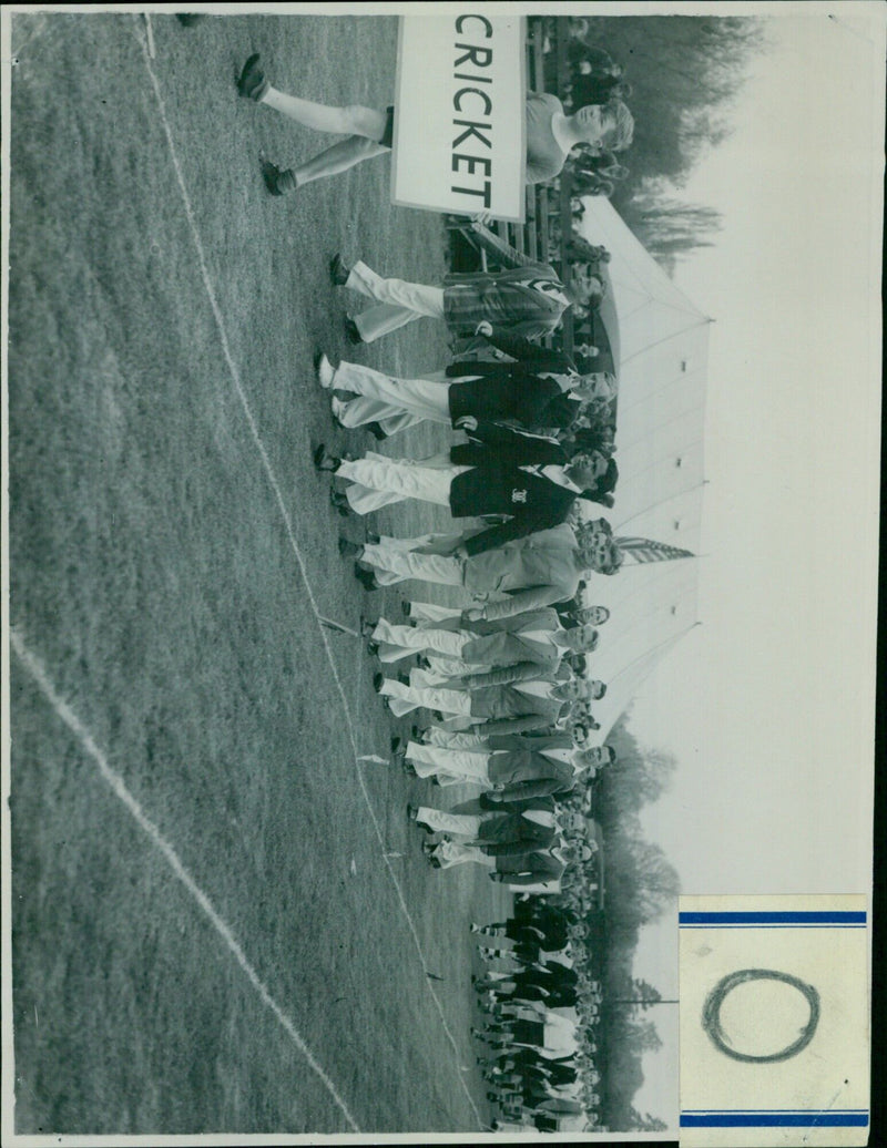 Cricket players in action during a match. - Vintage Photograph