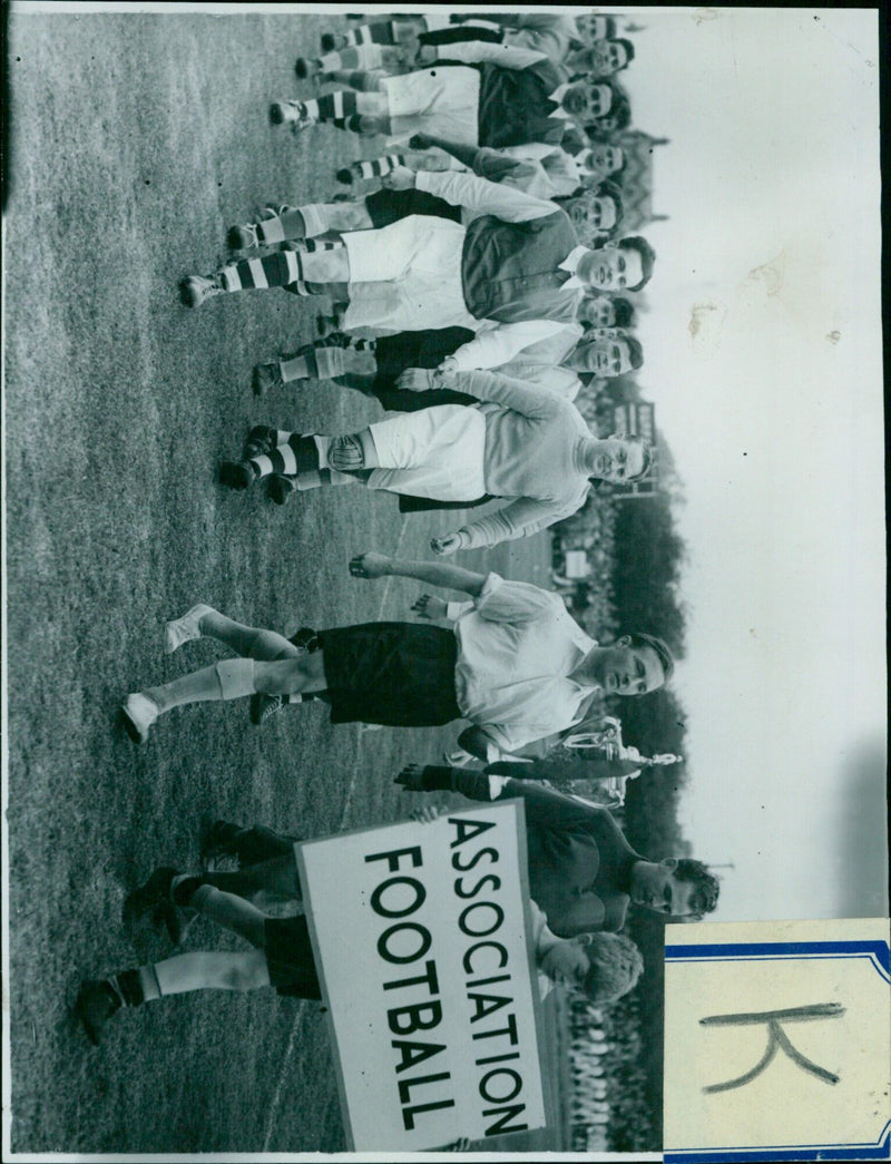 Members of a soccer team celebrate their victory. - Vintage Photograph