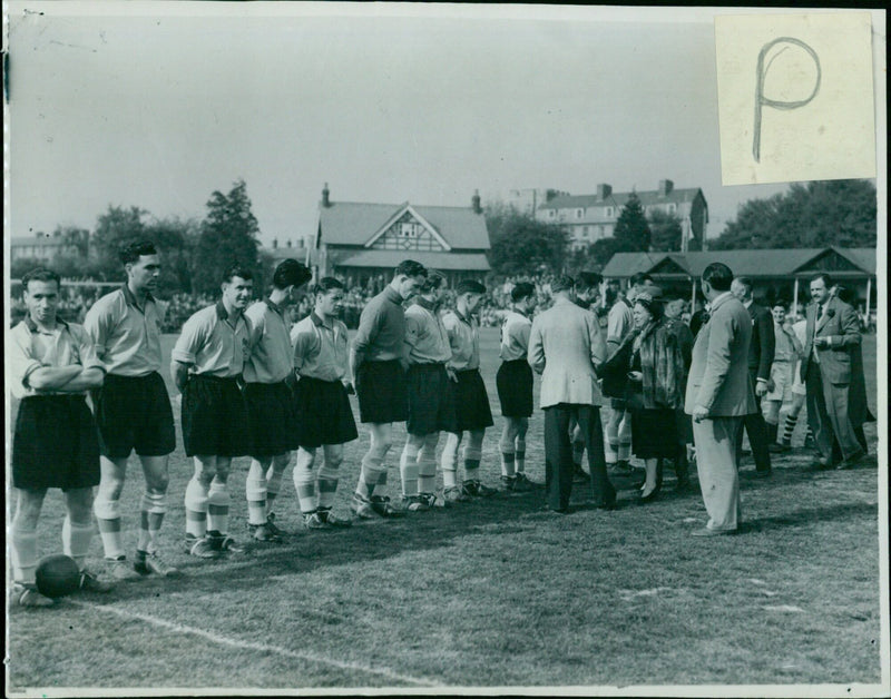 A group of students participate in a virtual graduation ceremony. - Vintage Photograph