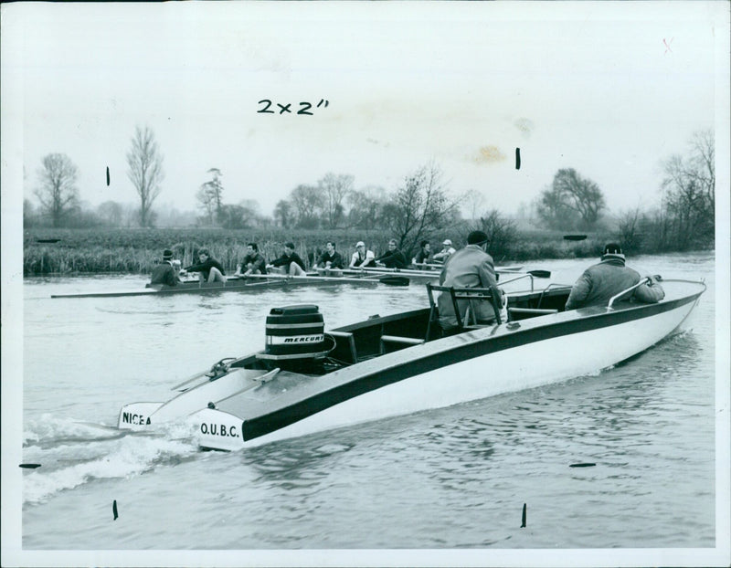 Rowers compete in a sports round-up at the NICEA O.U.B.C. 2x2 Mercury H leds SAT in Barnet, Hertfordshire. - Vintage Photograph