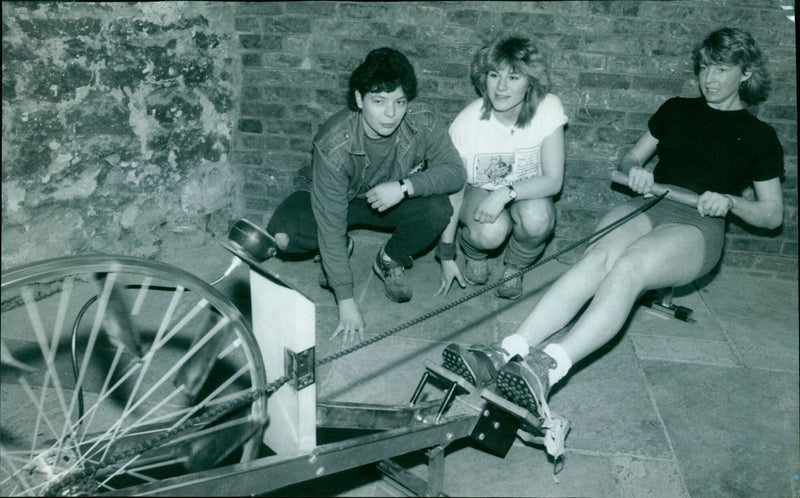 Alison Bonner rows during a sponsored half hour at Oxford's Green College. - Vintage Photograph