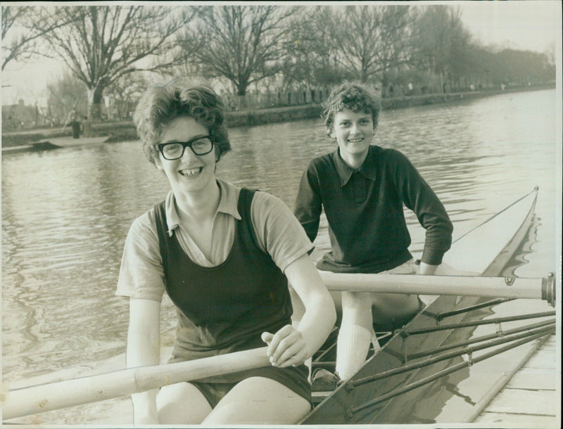 Two St. Hilda's College students, Janet Whiteway and Vicky Rollason, become the first women to challenge men's rowing events. - Vintage Photograph