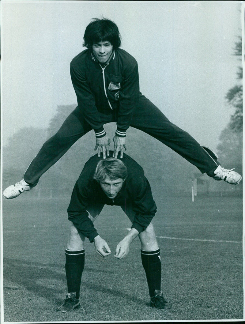 Two members of the Oxford University Hockey Club practice in the parks. - Vintage Photograph