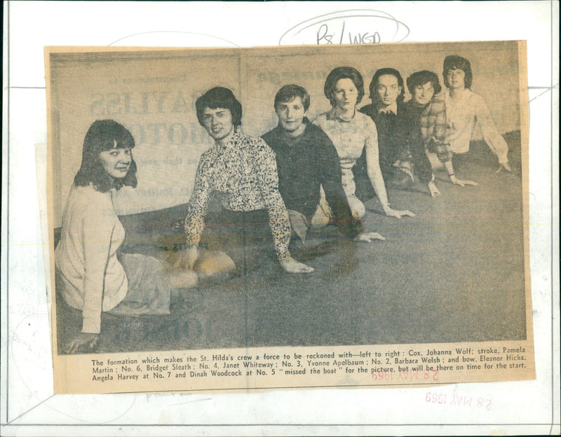 The St. Hilda's crew lines up in preparation for a race. - Vintage Photograph