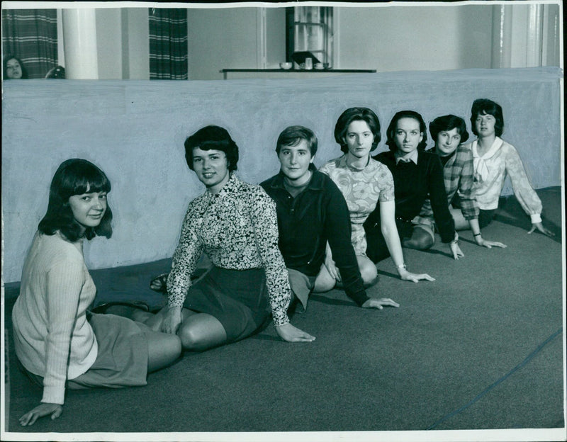 The St. Hilda's crew lines up in preparation for a race. - Vintage Photograph