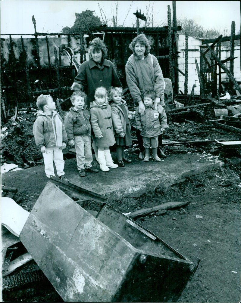 A group of people gather for a meeting in a nursery school. - Vintage Photograph