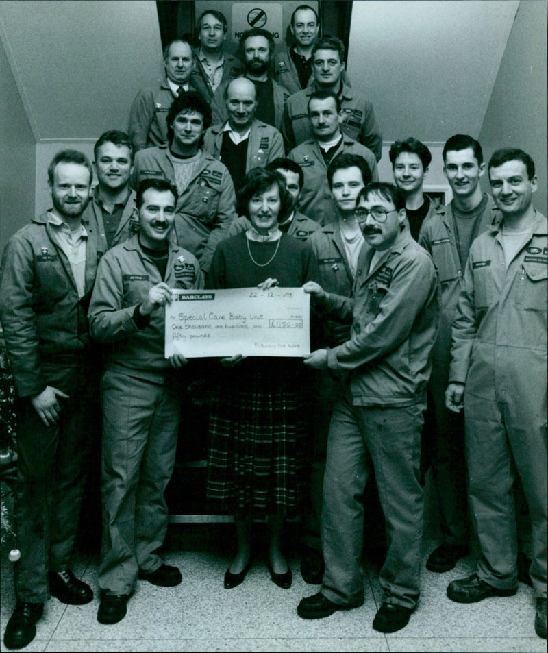 Vivienne Parry from SSNAP receives a cheque for £1150 from Austin Rover staff. - Vintage Photograph