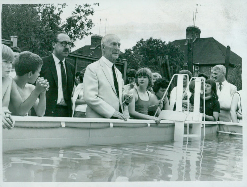 Mr. A. E. Heath, headmaster, and Coun. A. Constable, officially open the new swimming pool at St. Andrew's School in Headington. - Vintage Photograph