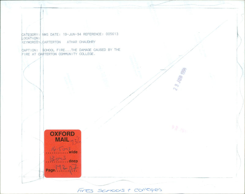 Fire damage at Carterton Community College is seen in this June 19, 1994 photograph. - Vintage Photograph
