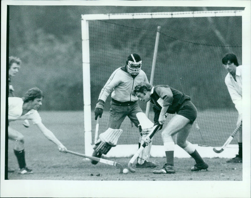 Lincoln keeper Simon Readhead oversees a goalmouth struggle during Oxford University Hockey Cuppers final. - Vintage Photograph