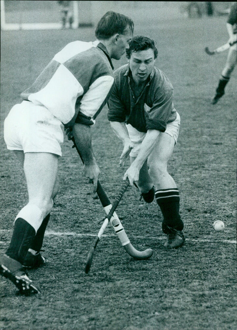 Oxford University Hockey Club struggles to a 1-0 loss in London League match against Guildford. - Vintage Photograph