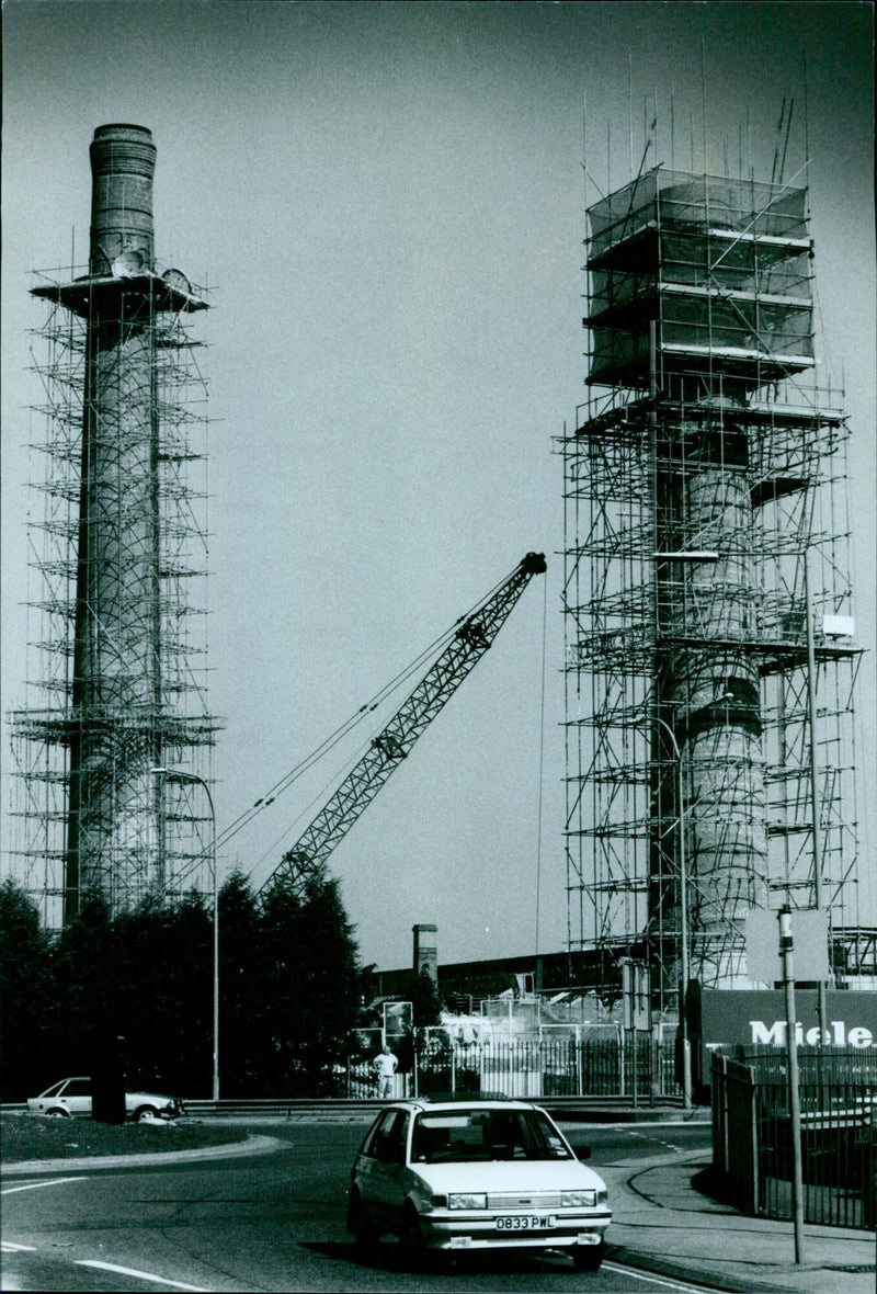 Dismantling of the Cowley Rover Works chimneys in England. - Vintage Photograph