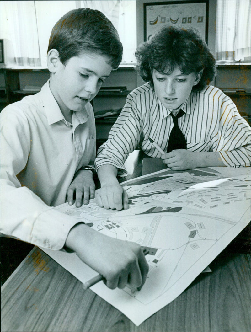 Police cadets Adam Pearce and Lisa Stankowski plan their route to an incident. - Vintage Photograph